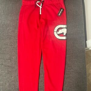 This is a pair of Ecko Unltd men's red fleece jogger sweatpants
